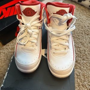 Red and white Jordan 2s
